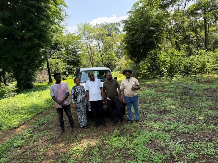 The Moyica team with farm workers at the plantation
